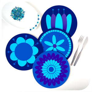 Set of 4 retro floral round placemats in blues & purples, on a white table with cutlery and vintage serving dish | The Inkabilly Emporium